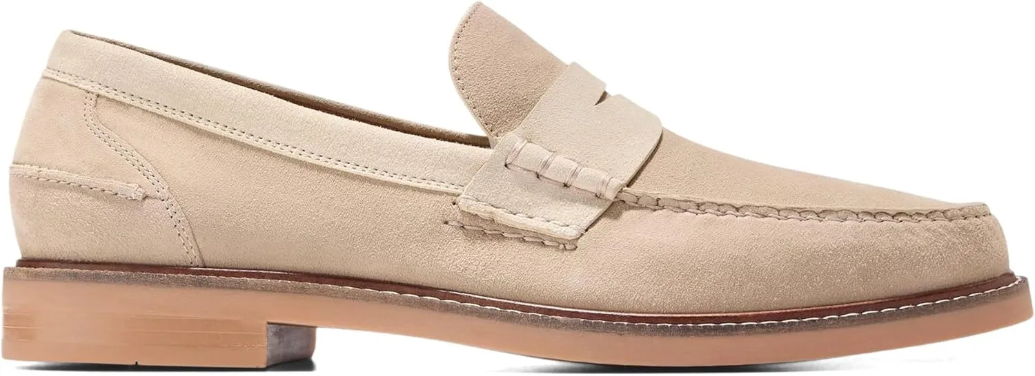 Cole Haan Men's Look Extraordinary with Your Impeccable Fashion Legacy Wearing Pinch Prep Penny Loafers. The Pull-on Footwear Features Leather Upper Construction with