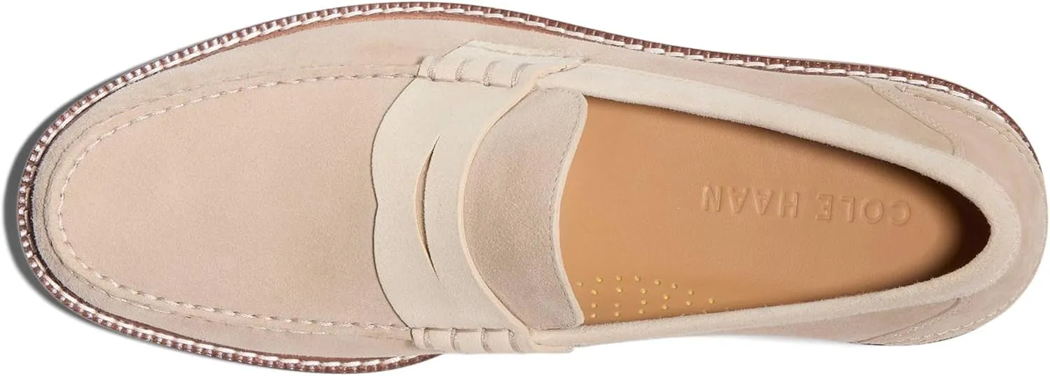 Cole Haan Men's Look Extraordinary with Your Impeccable Fashion Legacy Wearing Pinch Prep Penny Loafers. The Pull-on Footwear Features Leather Upper Construction with